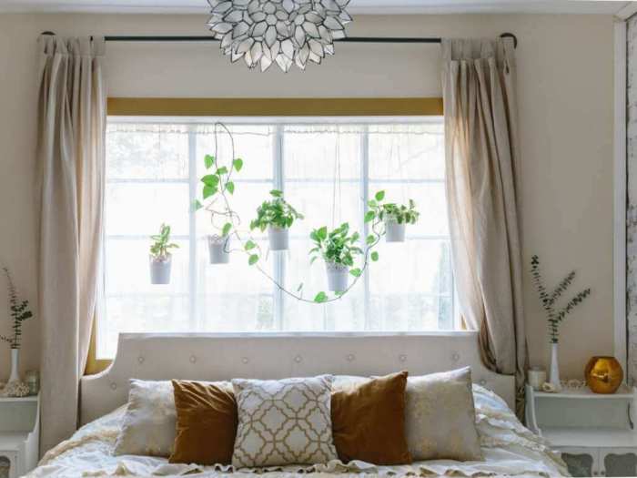 How to decorate window behind bed